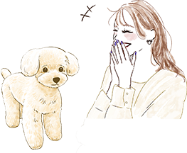 子犬と笑う女性
